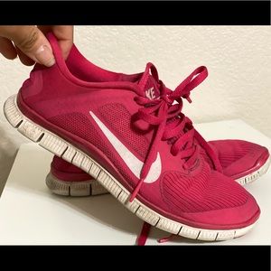 Pink Nike running shoes